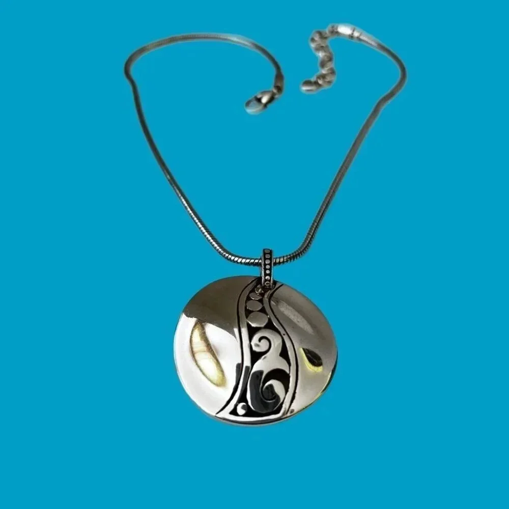 Brighton A La Mode Silver Pendant Retired Necklace. Beautiful silver plating.